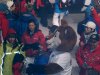 Foxy, the 2008 Arctic Winter Games Mascot, celebrates with athletes at the closing ceremonies on March 15th.