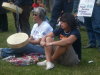 Reanna Erasmus, left, listens to speakers during the rally.