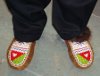 Finance Minister Michael Miltenberger shows off his new moccasins on budget day.