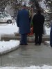 NWT Commissioner George Tuccaro at attention after laying a wreath on behalf of Queen Elizabeth II.