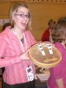 Sarah Sherman of Fairbanks, Alaska, shows off the coveted Arctic Winter Games golden ulus.