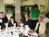 Mr. and Mrs. Waters with Dennis. Volunteers from the Katamavik program served dinner.