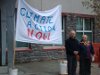 Dennis speaks at the Greenstone Building alongside Rev. Ron McLean of Holy Trinity Church, during Climate Action Day.