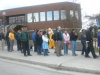 Hungry Yellowknifers lined up for hamburgers, hot dogs, veggie burgers and cake.