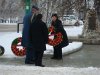 NWT Commissioner George Tuccaro preparing to lay a wreath on behalf of Queen Elizabeth II.