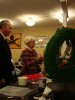 Long-time Yellowknifer Mrs. Barb Bromley places a poppy in remembrance.