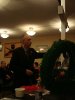 Western Arctic MP Dennis Bevington, placing a poppy in remembrance.